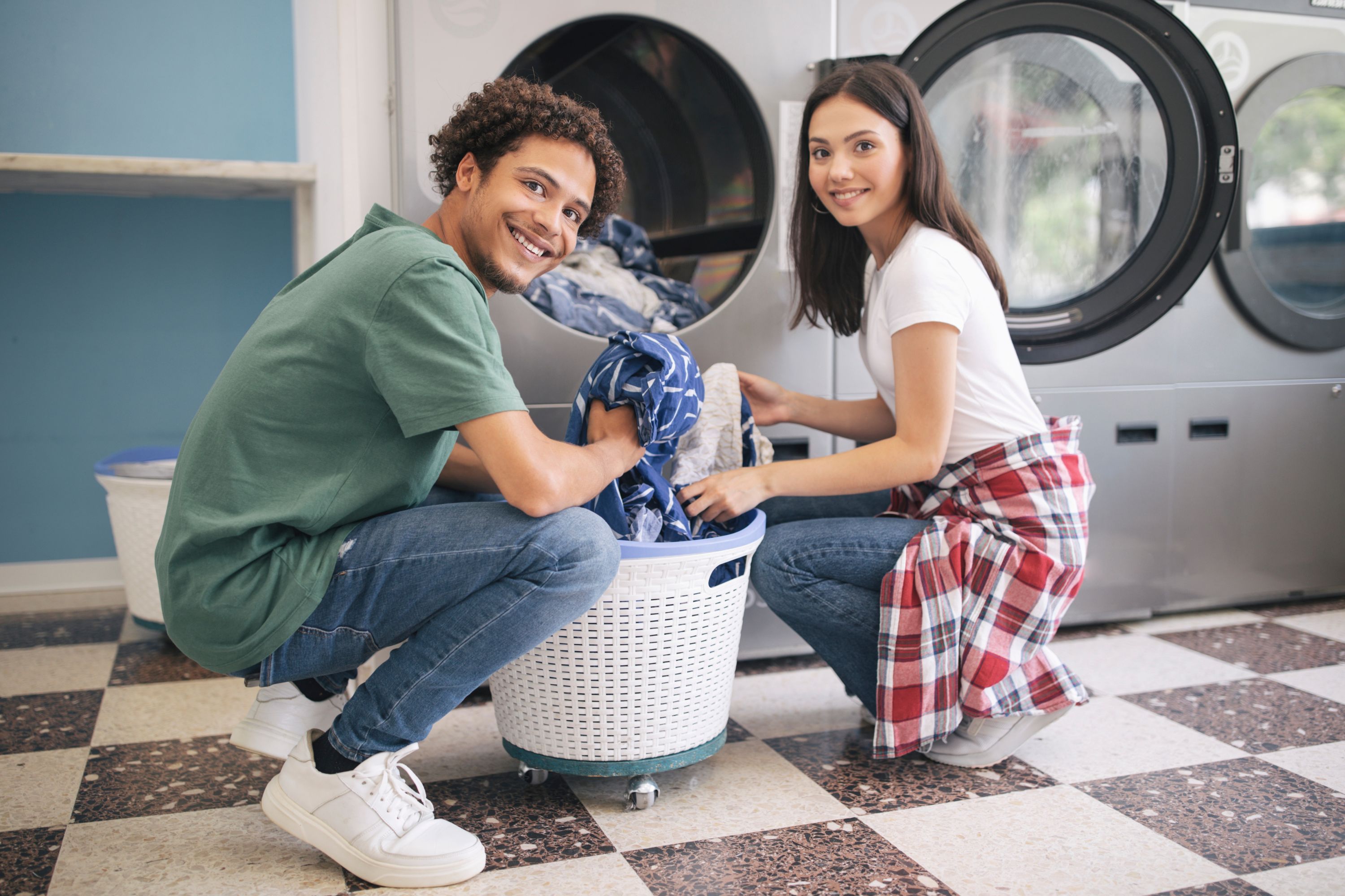 Laundromat Couple Shutterstock 2329252807
